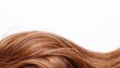 © photostockatinat - long, flowing auburn hair cascading in a gentle wave. The hair is healthy and shiny, showcasing its natural beauty.