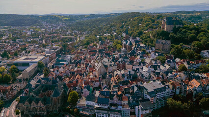 Wall Mural - An aerial panorama view around the old city Marburg in Germany on a sunny day in summer.