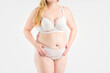© staras - Fat woman in white underwear on gray background, overweight female, obesity body, weight loss concept