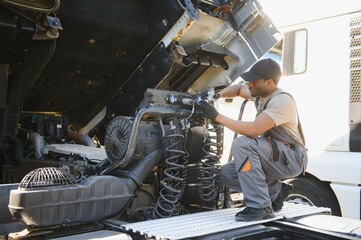 Aufkleber - Professional truck mechanic working in vehicle repair service