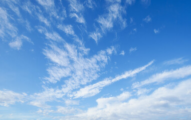 Wall Mural - beautiful blue sky with soft white clouds for abstract background