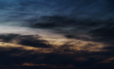 Wall Mural - beautiful and dramatic sunset sky with clouds as abstract background