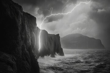 Wall Mural - A dramatic black and white image of lightning striking a coastal cliff during a stormy sea.