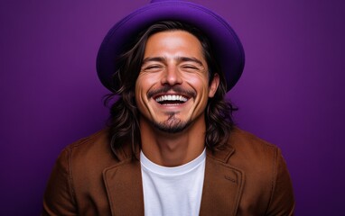 Wall Mural - A man wearing a purple hat is smiling and laughing