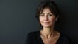 © BlackBird Studio - Elegant Portrait of a Confident Middle-Aged Woman with Dark Hair