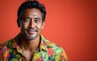 © hakule - A man with a mustache and a floral shirt is smiling