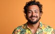© hakule - A man with a mustache and a floral shirt is smiling
