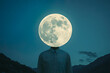 © Heart in pictures - Minimalist portrait of a person with a full moon for a head against a starry night sky and mountains