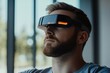 © Ева Поликарпова - A person wearing a virtual reality headset and sporting a beard, perfect for tech or innovation related concepts
