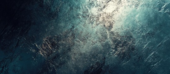 Wall Mural - abstract textured background with dark and light turquoise brush strokes and scratches.