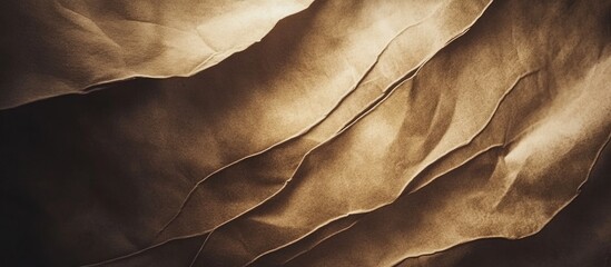Wall Mural - abstract textured brown fabric folds with soft lighting creating shadows and depth