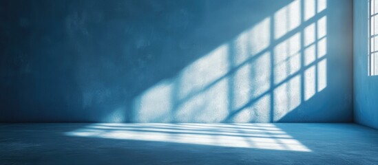 Wall Mural - Blue minimalist room interior with window shadows on wall and floor Copy Space