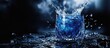 © VirtualVista - Splashing water in a crystal glass with blue liquid on a dark background creating dynamic water droplets Copy Space