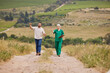 © Nina Lawrenson/peopleimages.com - Pointing, talking and veterinarian with farmer outdoor for agriculture, medical or sustainability. Appointment, healthcare and walking with veterinary woman speaking to man on farm for checkup