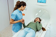© Dragana Gordic - Friendly Nurse Assisting Patient During Advanced Medical Imaging Procedure