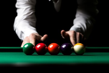 Focus on billiard balls arranged for a game with a player preparing to break in a darkened pool hall