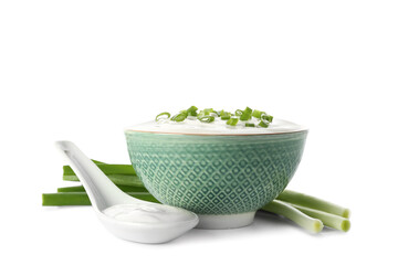 Wall Mural - Bowl of tasty sour cream with green onion on white background