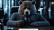 © Erich - Bear businessman wearing pinstripe suit and tie sitting at desk in modern office, concept of power and leadership