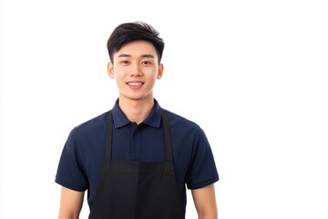 Wall Mural - Young man wearing a blue shirt and a black apron is smiling for the camera