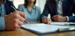 © miss irine - Real estate agent explains insurance, contract details to client before signing. Pro consultation. Client reviews legal agreement. Important financial decisions. People discuss purchase offer. Buying