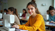 © miss irine - Young woman in yellow sweater sews on sewing machine in classroom. Students learn textile craft together. Group of students concentrated on projects. Modern fashion design workshop. Aspiring fashion