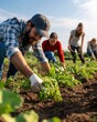 © Prakakrong - A diverse team of farmers planting seasonal vegetables in an open field, teamwork in organic agriculture, sustainable food production for the community