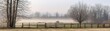 © Blueloner - Misty Winter Morning on Farmland Rural Foggy Landscape with Fence and Trees