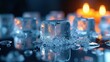© Xavi - Melting ice cubes on a reflective surface with burning candles in the background