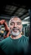 © BOJOShop - Smiling Mature Engineer  Robotics Factory  Industrial Worker Portrait