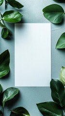 Fototapete - Blank paper surrounded by lush green leaves on a textured blue background inviting creativity and inspiration. Generative AI