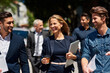 © peopleimages.com - Business people, architect team and plan in city, laughing and conversation for travel to building. Staff, urban development and walking to review property in town, collaboration and office design
