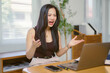 © Crystal - Businesswoman getting angry and arguing during video call meeting