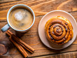 © AZM Art - Tasty morning coffee and cinnamon roll. Delicious dessert food background