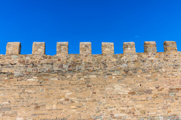 Wall Mural - Towers and walls of an ancient stone Genoese fortress in Sudak on the Black Sea coast in Crimea, Russia. Here is the museum-reserve 