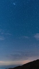 Wall Mural - night sky with stars, vertical time lapse view