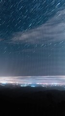 Wall Mural - endless cosmos above cityscape in spain, time lapse view