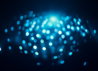 Poster - Abstract image of glowing blue bokeh lights, creating a luminous, swirling effect on a dark background.  The bright center suggests depth and energy.
