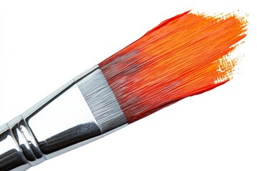 Poster - Brush covered with vibrant orange paint ready for artistic creation in a studio setting