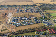 © AmazingAerialAgency - Aerial view of suburban residential district with homes and fields, Yarrawonga, Australia.
