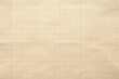 © Natawut - beige graph paper texture with brown grid lines