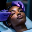 © bborriss - Beautician applying eyelash extension to young woman in beauty salon
