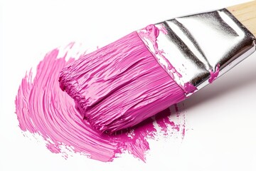 Aufkleber - Brush covered in bright pink paint on a white surface illustrates creative painting activity indoors