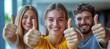 © neiros - A group of happy and satisfied male and female customers sharing positive feedback. Five cheerful and joyful young people giving thumbs up together. Close-up of their hands. Illustrating