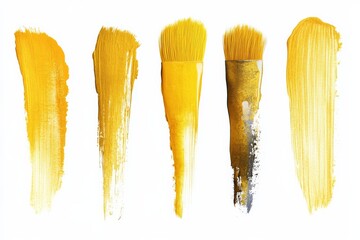 Leinwandbilder - Bright yellow paint strokes and brushes displayed for creative inspiration and artistic projects in an art studio setting