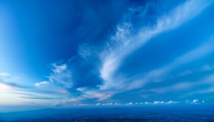 Wall Mural - vibrant blue clouds swirling against a soft gradient backdrop evoking a sense of serenity and nature
