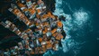 © pete99 - Coastal village aerial, ocean waves crashing, cliffside homes, travel