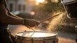 © Phurichai - Musician Playing Drums at Golden Hour Sparkling Water Droplets Close Up