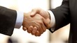 © Zoro - Two businessmen shaking hands, signifying agreement and partnership.