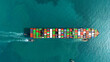 © boygek - Top view Container ship full capacity approaching the port by a tugboat occupying the port International Container ship loading, unloading at sea port, Freight Transportation, Shipping,  Vessel. Logis