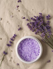 Wall Mural - Lavender bath salts and fresh lavender flowers on a linen background.  Relaxing spa setting.